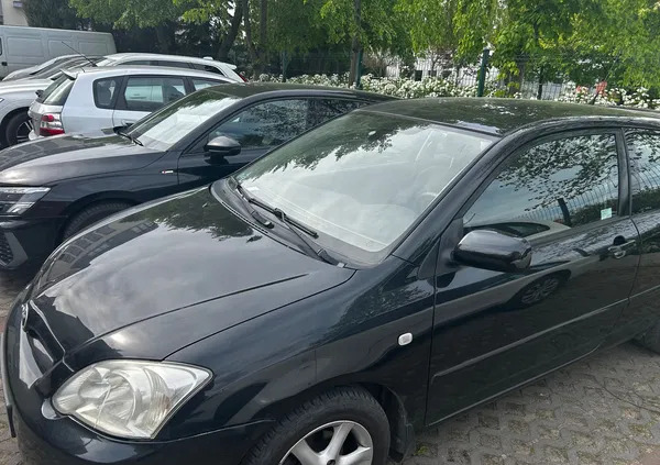 toyota corolla śląskie Toyota Corolla cena 11000 przebieg: 209427, rok produkcji 2004 z Poznań